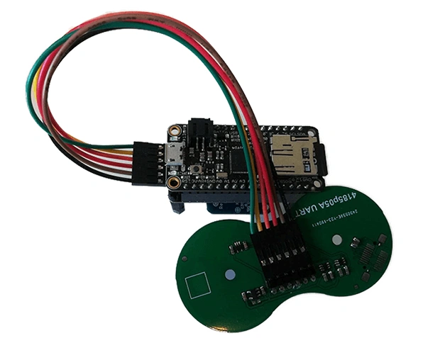 Data logger for tracking device showing embedded circuit board and wiring, developed by Digital Dividend.