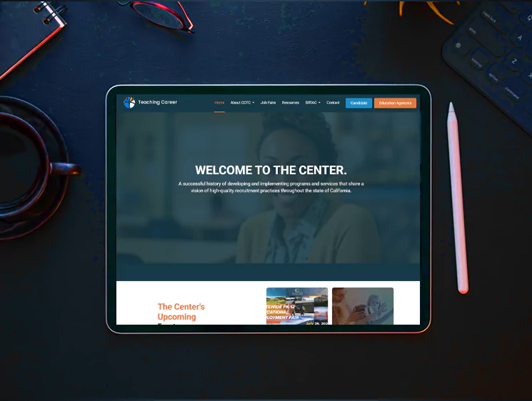 A top-down view of a tablet displaying a professional recruitment portal, illustrating the Core Features Implemented by Digital Dividend for Job & Agency Management Portal, set on a desk with a coffee cup and stylus.